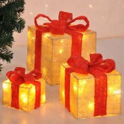 Haushalt International Verlichte Kerstfiguren^Hhi Led Geschenkdoos - 3 Delig - 3 Maten - Goud/Geelkleurig Met Rode Strik